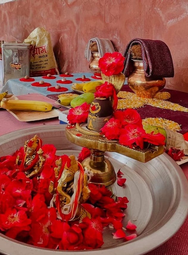 Sacred fire (havan) with priest offering ahutis